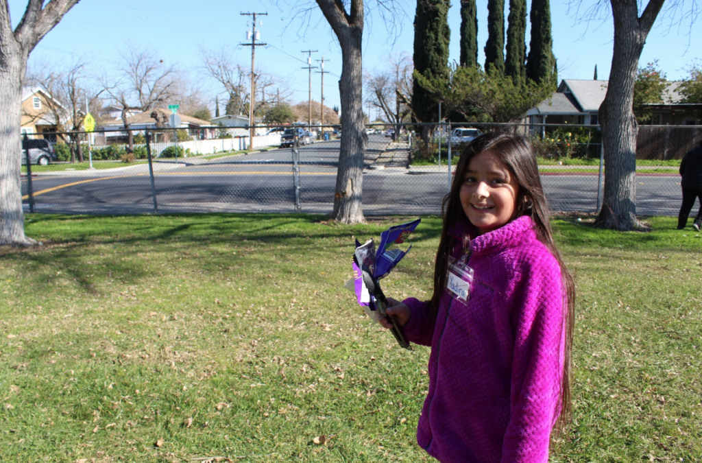 Our programs will encourage all students to get outside and take environmental action in their local community, like this Antioch student during a litter cleanup last year!